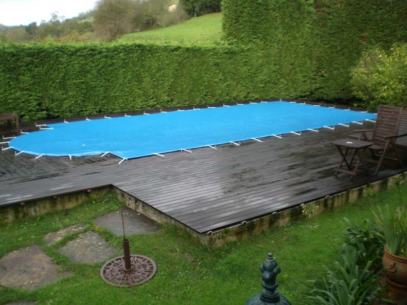 Piscinas Oruña piscina y jardín